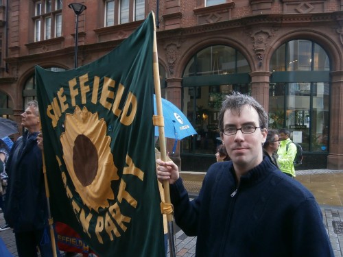 Brian Webster with Green Party banner Education Rally June 2013